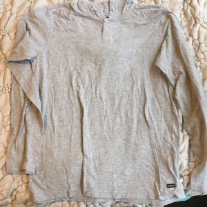 Gray hooded long sleeve tee.